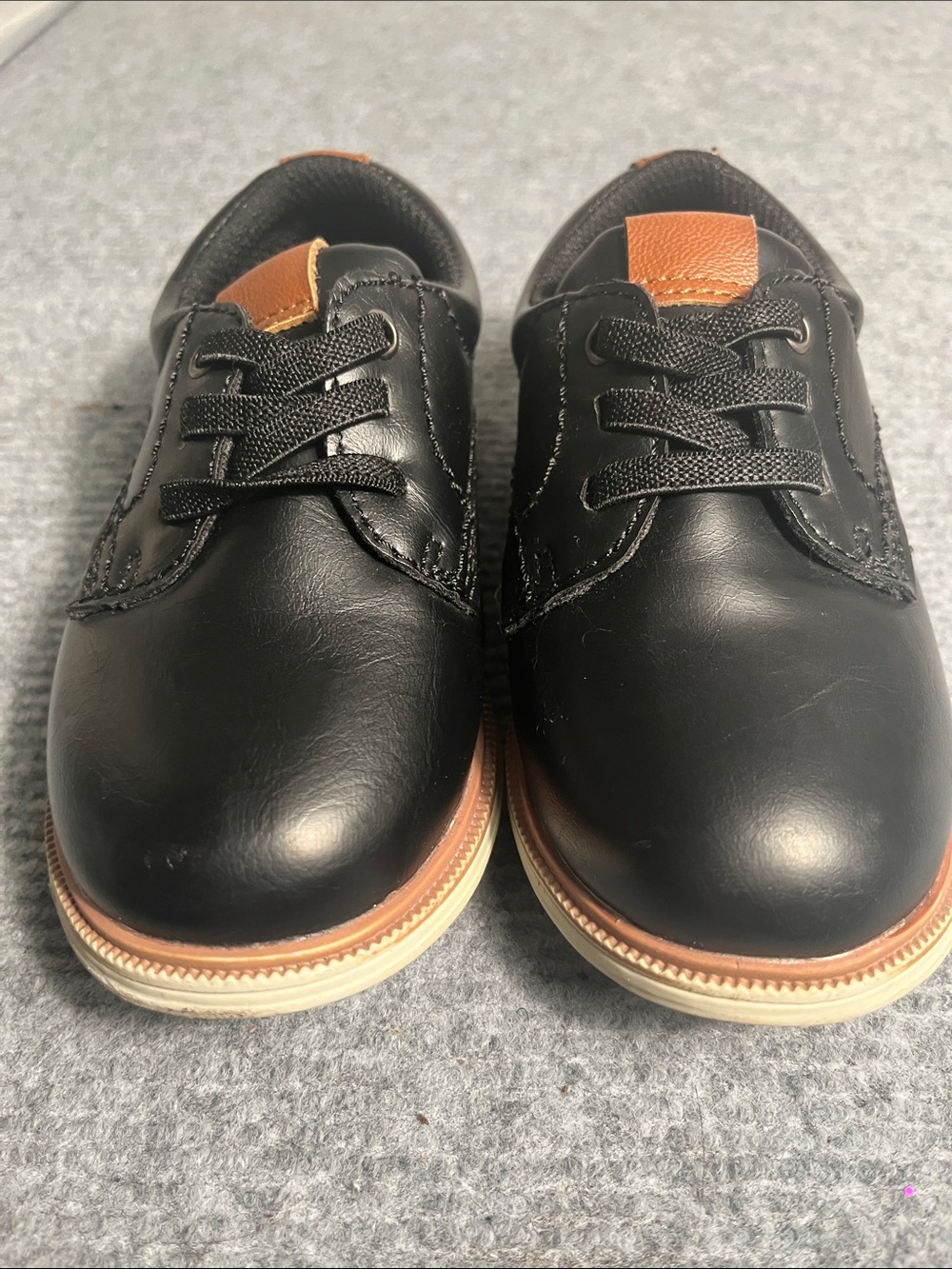 Black Oxford Lace-Up Shoes with Tan Accents. Small scuff mark on toe bed.